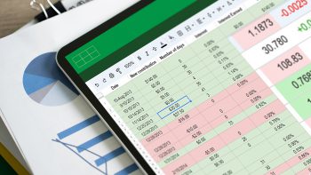 businessman working with data and graphs in spreadsheet documents for online analysis Microsoft Excel project dashboard accounting digital